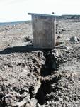 This crack is so close to the edge of the cliff that you might feel uncomfortable using this outhouse...