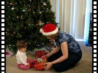 Katya enjoys a Christmas present