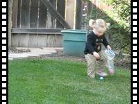 Misha and Katya hunting for eggs in our backyard